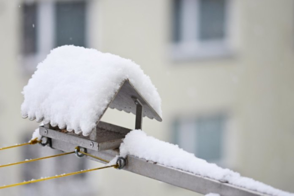 В середине февраля в Новосибирске начнется чистка кровель домов от снега